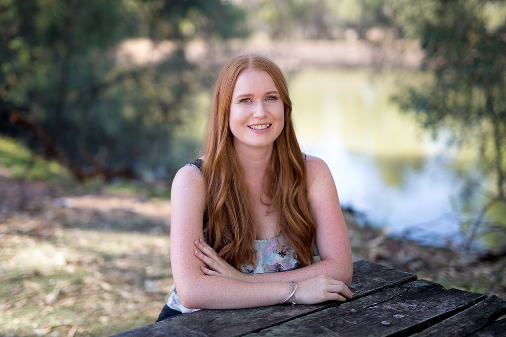 Mel Donnelly seated outdoors